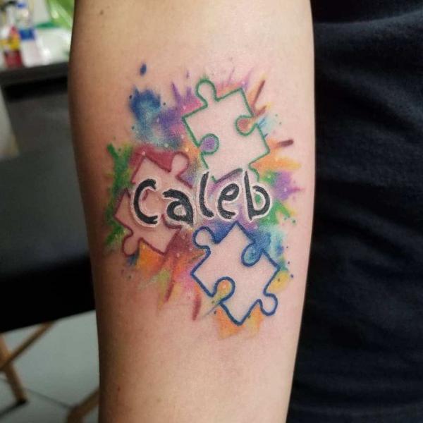 Three negative space tattoo on watercolor backdrop