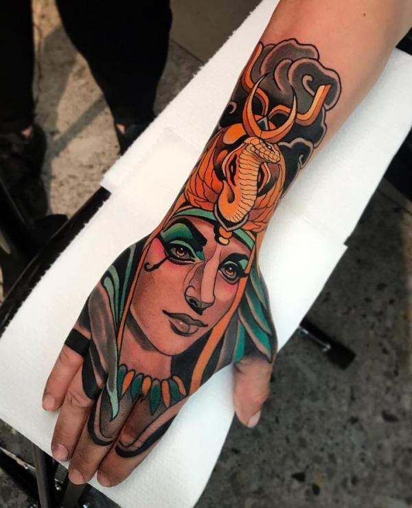 Traditional Cleopatra hand tattoo