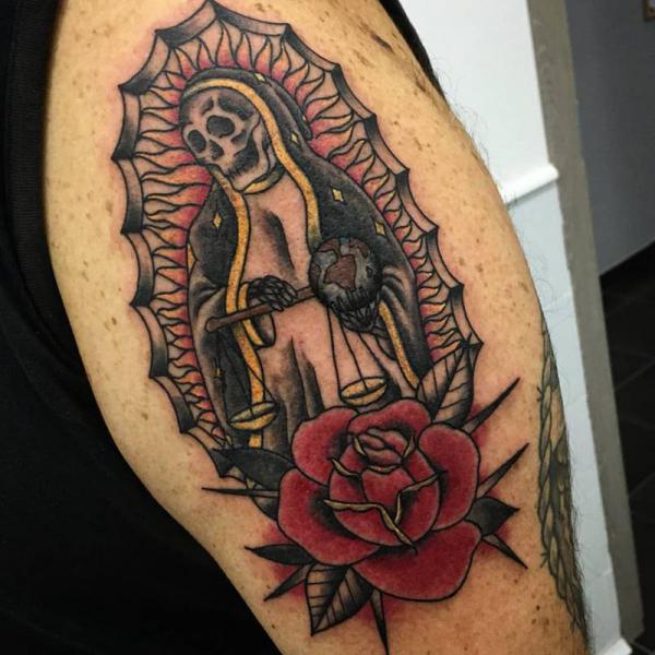 Traditional Santa Muerte holding scales of justice tattoo