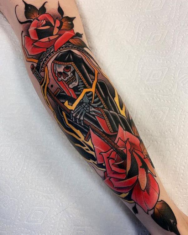 Traditional Santa Muerte skeleton with roses tattoo