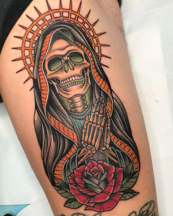 Traditional Santa Muerte with rose and praying hands tattoo