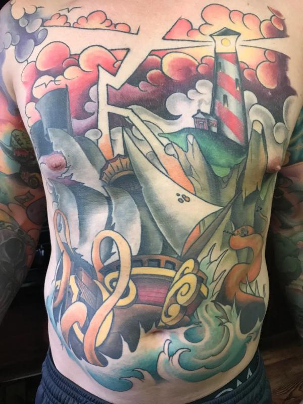 Traditional shipwreck cloud and lighthouse tattoo
