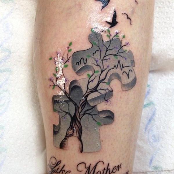 Two puzzles with tree tattoo