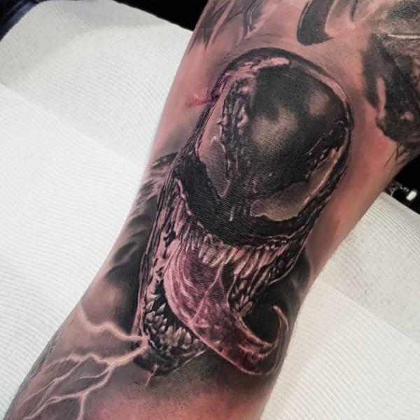 Venom knee tattoo