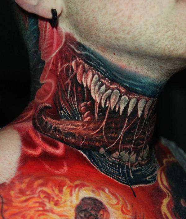 Venom neck tattoo