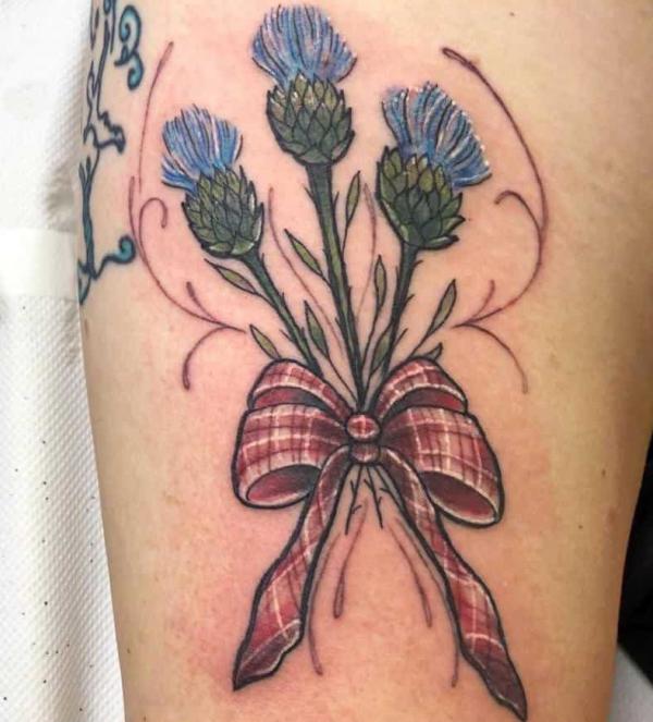 Vintage Thistle with bow tattoo