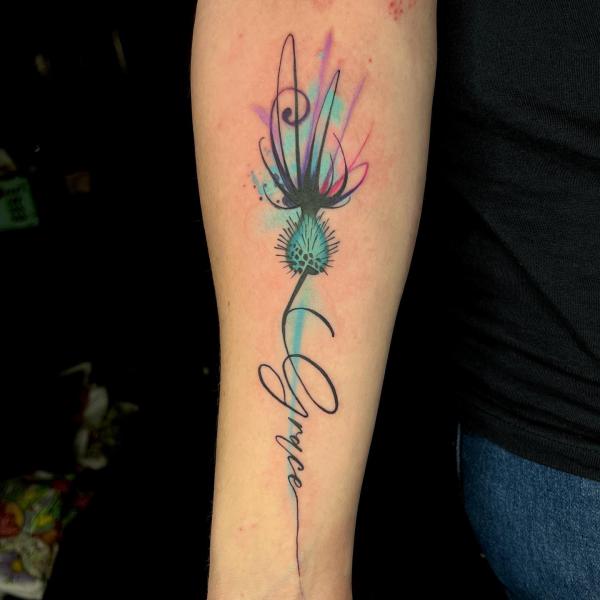 Watercolor abstract thistle tattoo with word