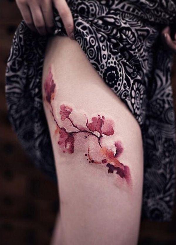 Watercolor cherry blossom thigh tattoo