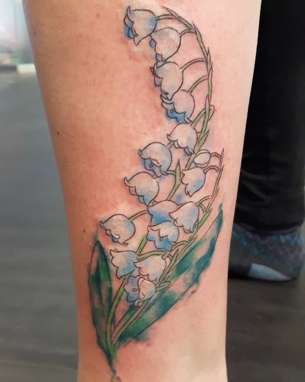 Watercolor lily of the valley tattoo