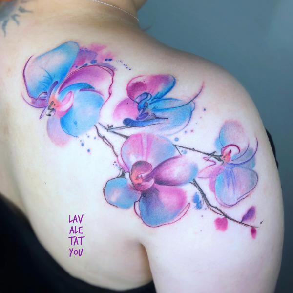 Watercolor orchid shoulder tattoo