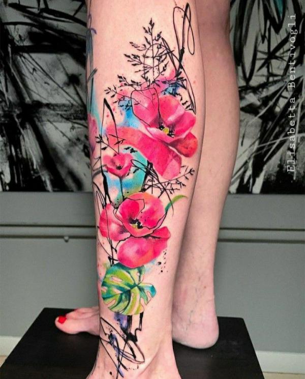 Watercolor poppy low leg tattoo