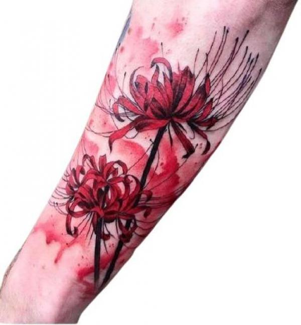 Watercolor spider lily on the forearm
