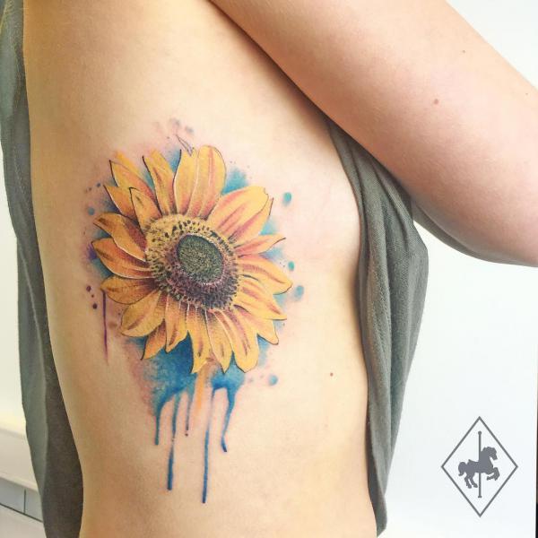 Watercolor sunflower side tattoo for women