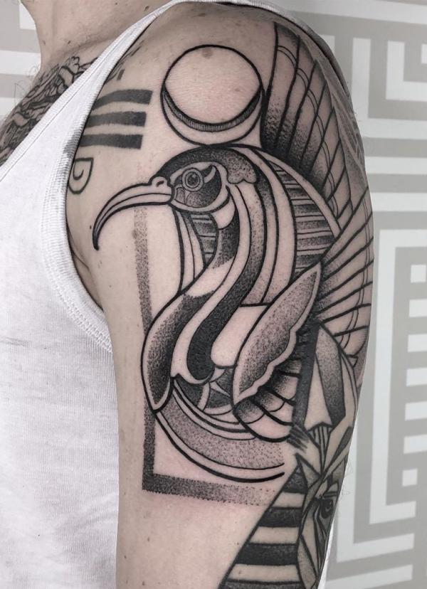 Writing Thoth Ibis half sleeve tattoo