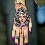 feminine medusa hand tattoo