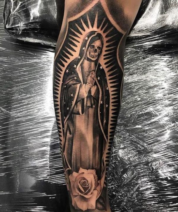 santa Muerte calf tattoo