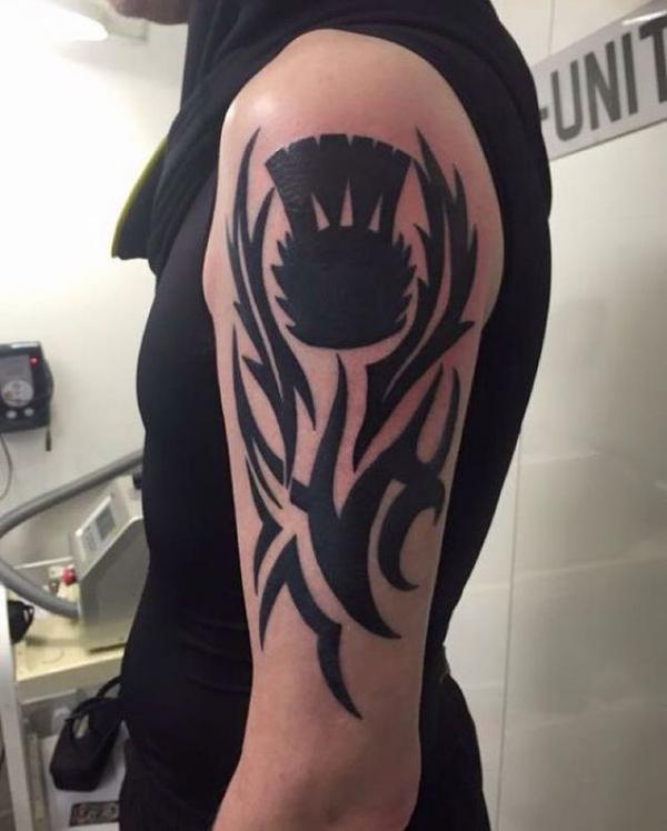 tribal celtic thistle tattoo