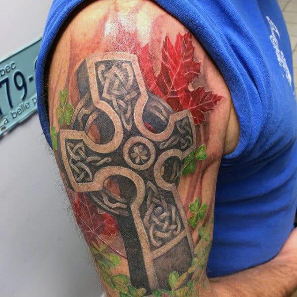 3D Celtic cross with clovers and fall leaves tattoo