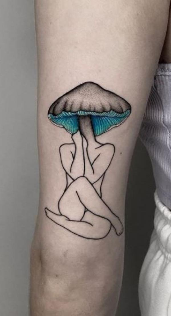 A woman outline with a mushroom