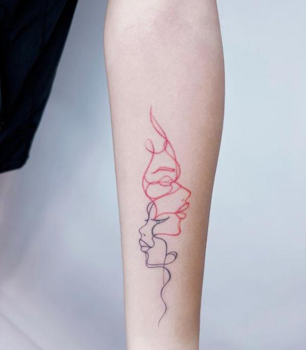 Abstract human face outline tattoo