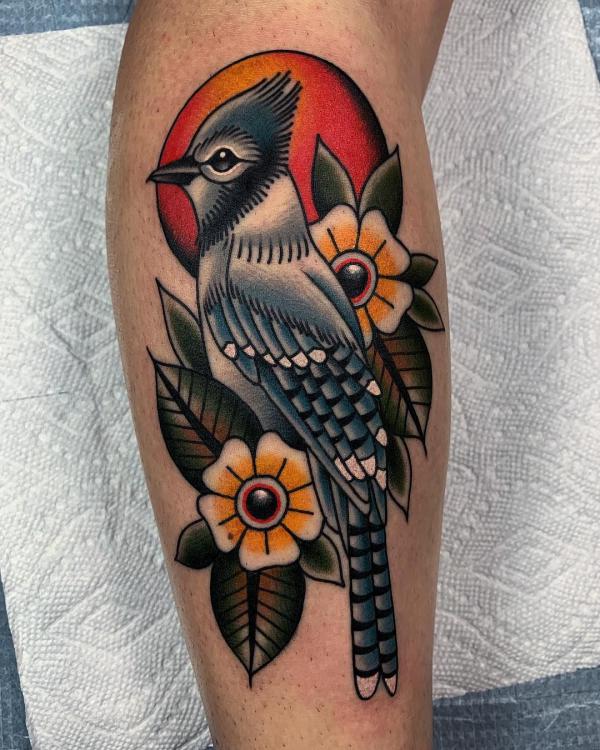 American traditional Blue Jay with sun and flower tattoo