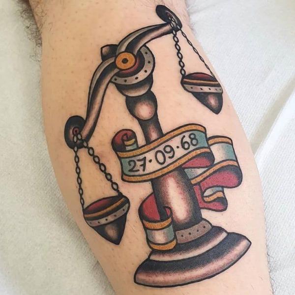 American traditional Libra tattoo with date tattoo