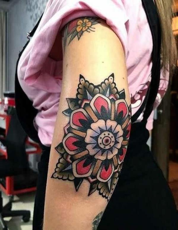 American traditional lotus elbow tattoo