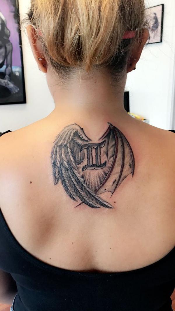 Angel and Devil wings gemini sign tattoo