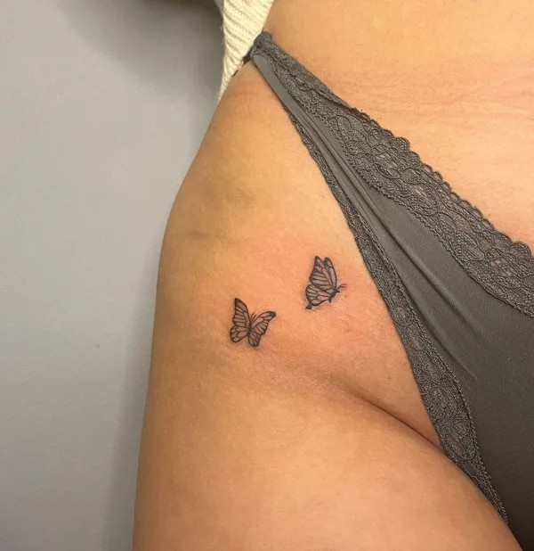 Bikini line butterflies tattoo