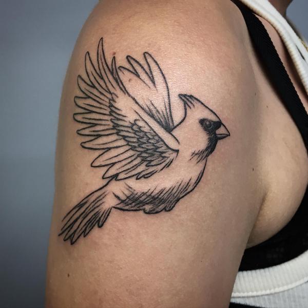 Black and grey cardinal in flight tattoo