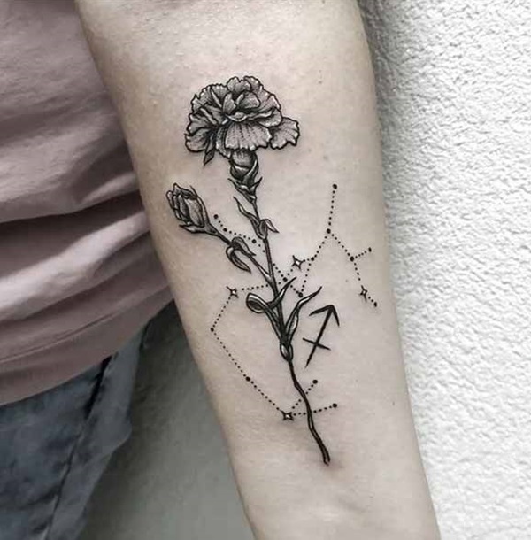 Black and grey sagittarius carnation tattoo