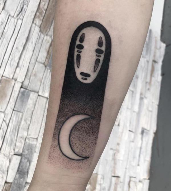 Black and white No Face with crescent moon tattoo
