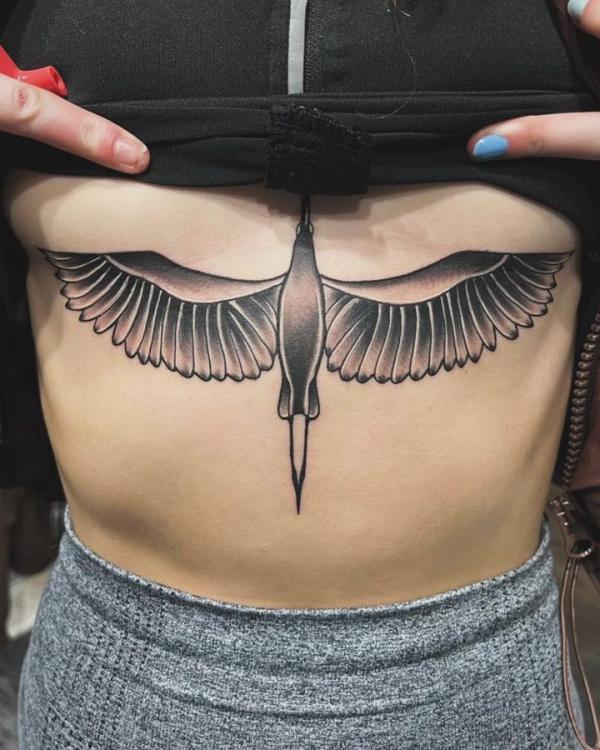 Black and white bird sternum Tattoo