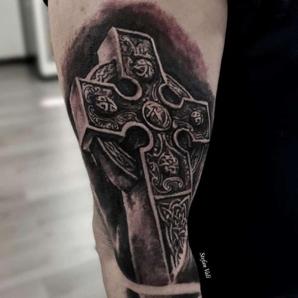 Blackwork Celtic cross tattoo in 3D style
