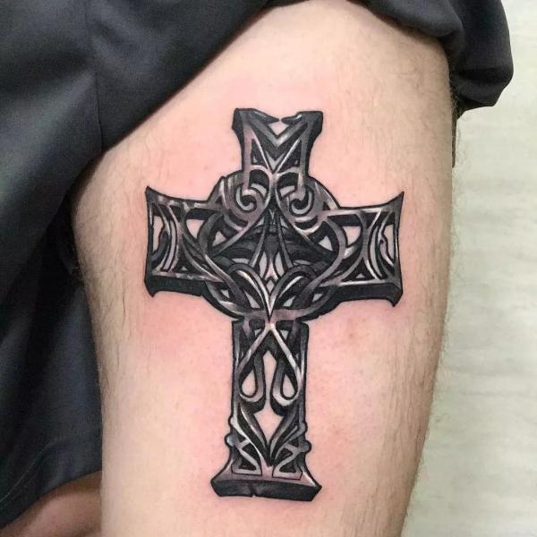 Blackwork Celtic cross tattoo