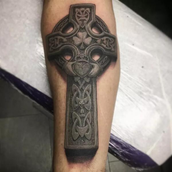 Blackwork Celtic cross with Trinity Knot and clover tattoo