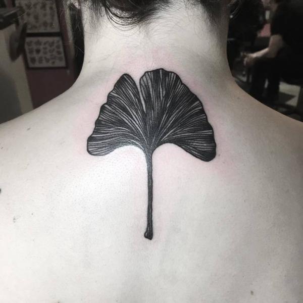 Blackwork Ginkgo leaf neck tattoo