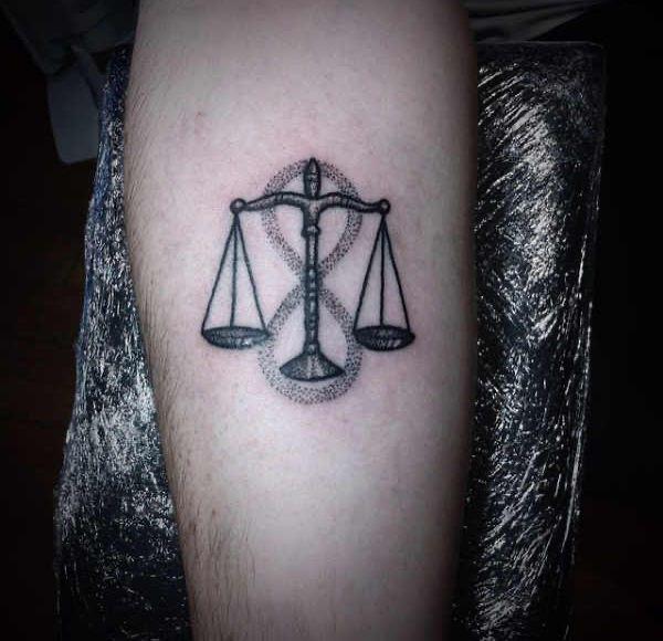 Blackwork libra with infinity tattoo