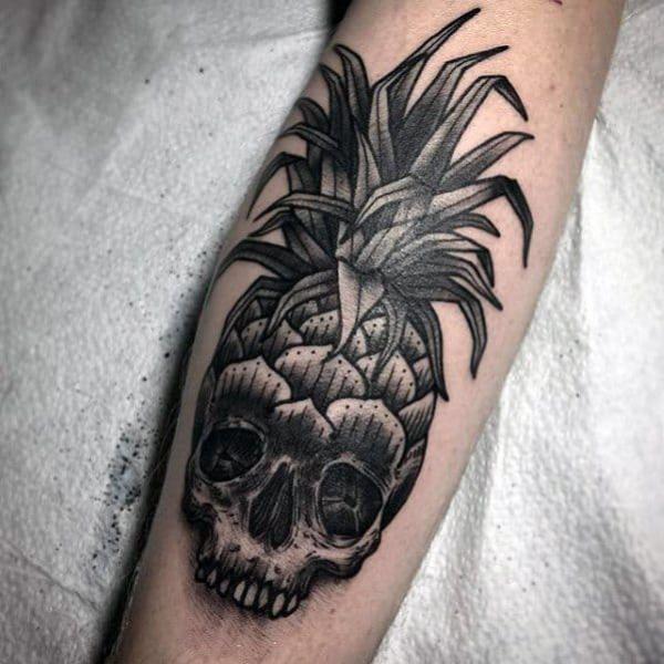 Blackwork pineapple skull tattoo
