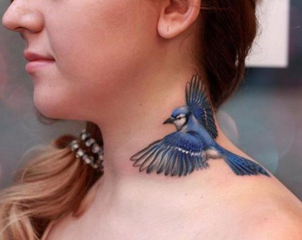 Blue Jay in flight neck tattoo