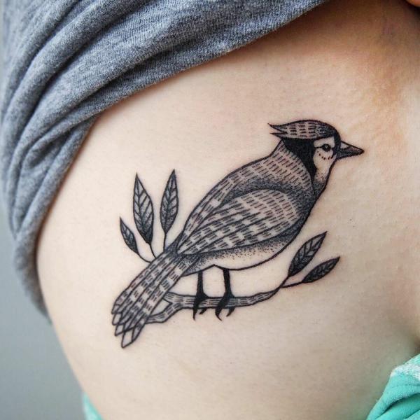 Blue Jay side tattoo black and grey