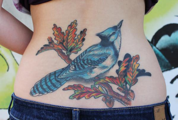 Blue ray low back tattoo
