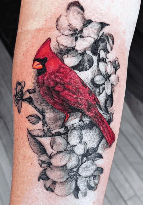 Cardinal and purple dogwood flower in snow tattoo