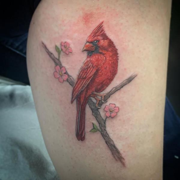 Cardinal thigh tattoo