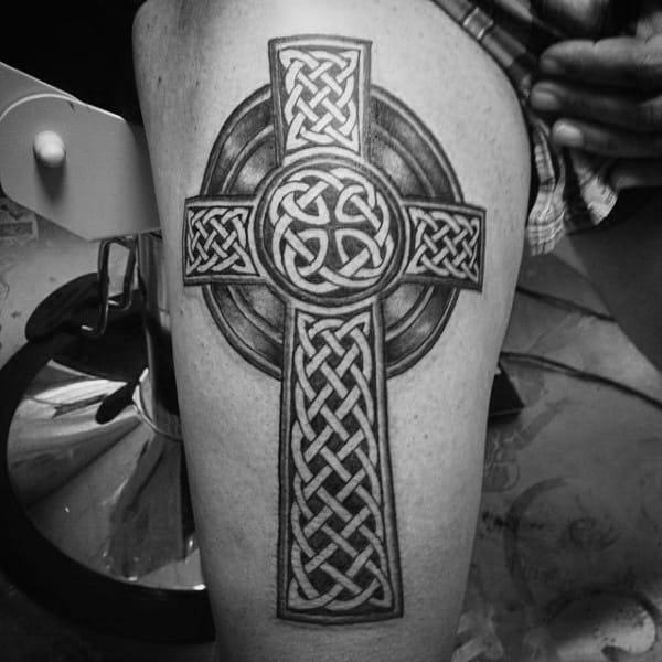 Celtic cross thigh tattoo black and grey