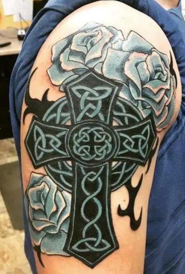 Celtic cross with Trinity Knot and blue rose tattoo