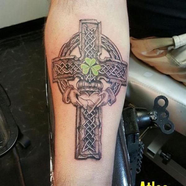 Celtic cross with Trinity Knot and clover inner forearm tattoo