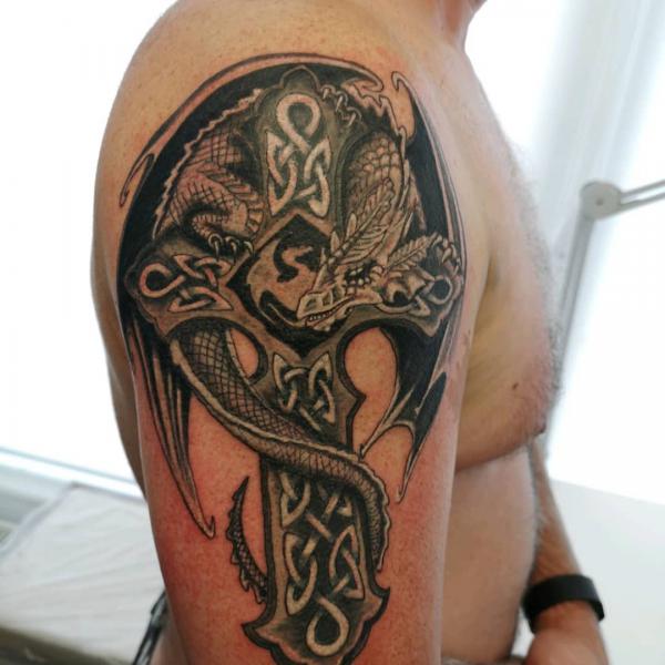 Celtic cross with Trinity Knot and dragon tattoo