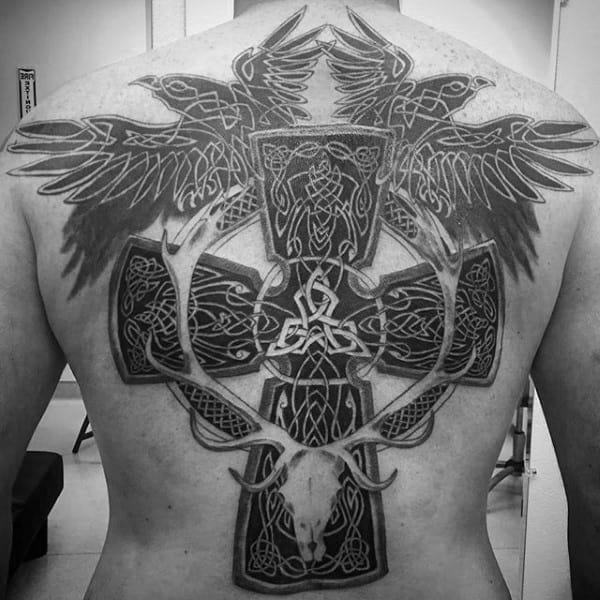Celtic cross with animal skull and a pair of raven full back tattoo