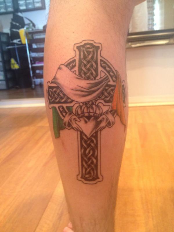 Celtic cross with claddagh and Irish flag tattoo